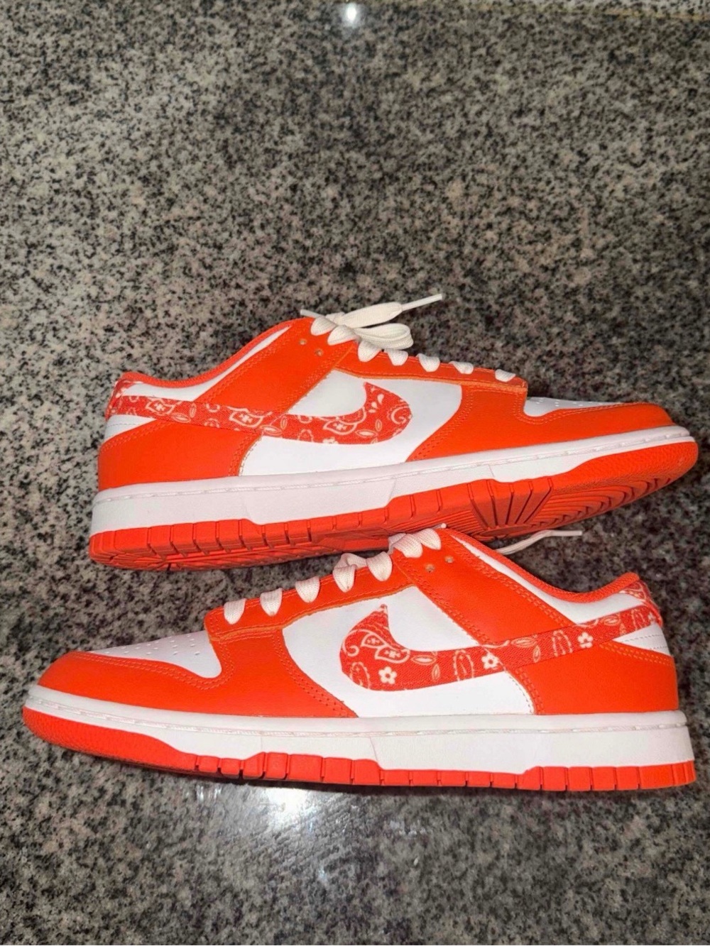 Nike Low-Top Sneakers in Orange and White with Paisley Swoosh